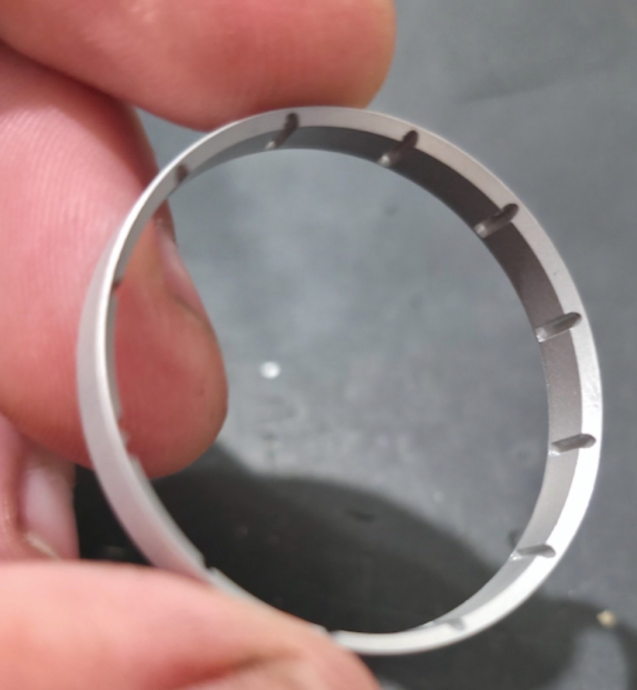 Machined REDTIM 3D90 rehaut ring — the seats for each vertical 3D lume cylinder